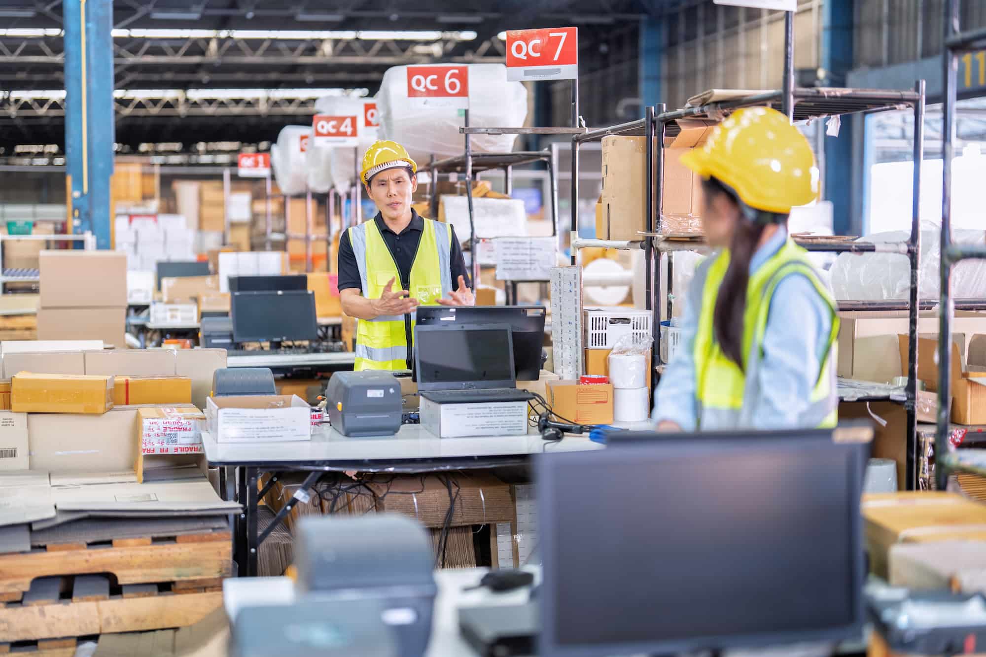 Staff checking goods in a warehouse